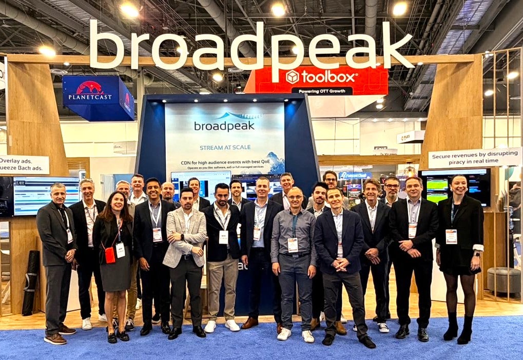 Broadpeak team at NAB Show booth showcasing streaming, CDN, and monetization solutions, with team members gathered in front of the exhibition stand.