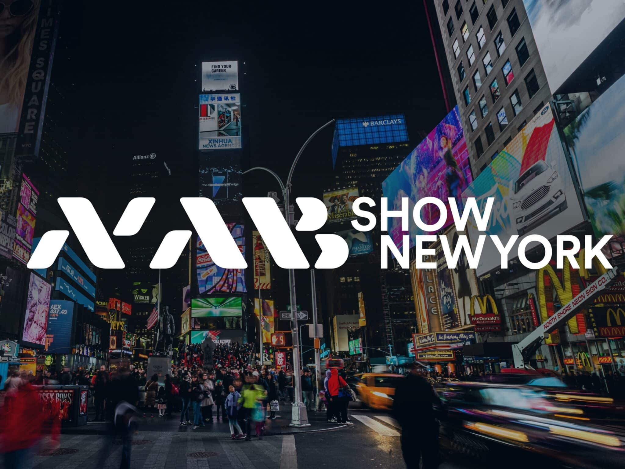 NAB Show New York logo over a nighttime view of Times Square, promoting the broadcast, media, entertainment and content technology industry event in New York City