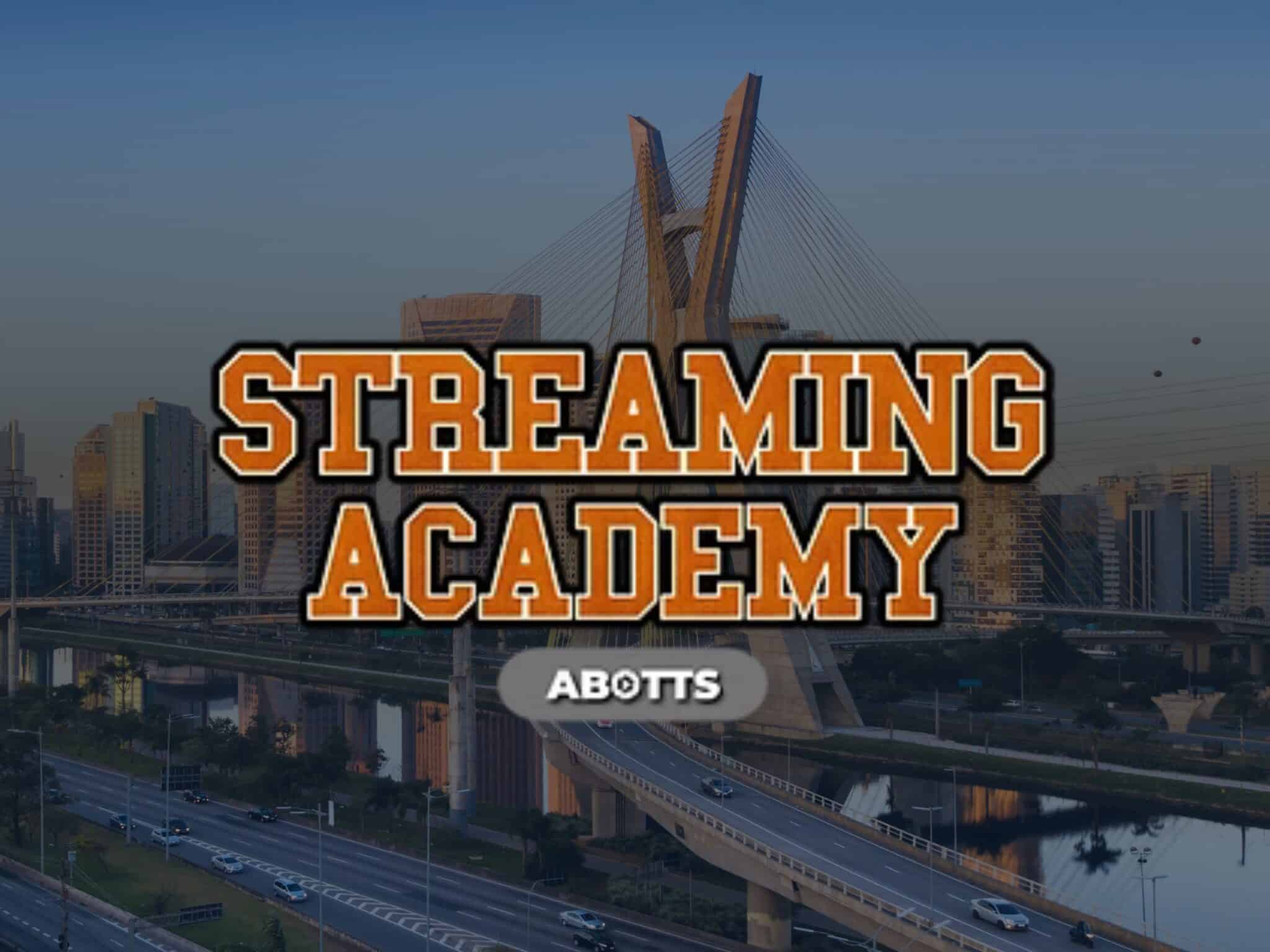 Streaming Academy ABOTTS logo over a view of São Paulo, Brazil, featuring the Octávio Frias de Oliveira Bridge, promoting the streaming and broadcast technology training event